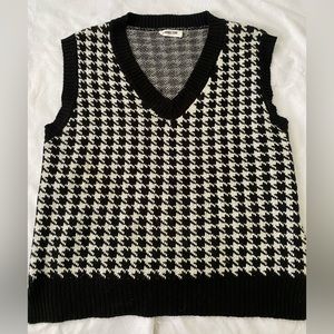 Checkered black and white sweater vest